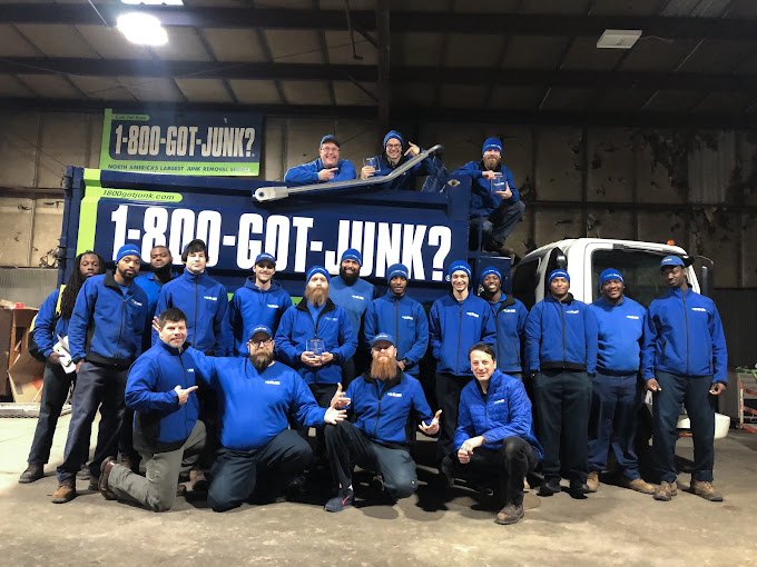 20 1-800-GOT-JUNK? St. Louis team members posing in front of a junk removal truck 20 1-800-GOT-JUNK? St. Louis team members posing in front of a junk removal truck